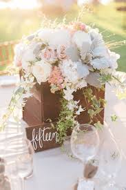 57 Fresh Centerpieces And Decorations To Spruce Up Your Table For Spring Spring Wedding Flowers Centerpieces Flower Centerpieces Wedding Spring Wedding Centerpieces