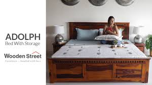 Despite the development of new technologies and many different materials, wooden bed design it's a classic that never goes out of fashion. Adolph Bed With Storage Solid Wood Bed Design Wooden Street Youtube