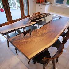 Totalboat diy epoxy river table kits contain totalboat high performance epoxy & hardener, prep tools, mixing tools, epoxy coloring agents, polishing materials, and other handy items that make it easy and fun to create a beautiful wood river table. Live Edge Walnut Kitchen Table With Clear Epoxy River Anglewood Live Edge Custom Furniture Toronto