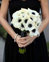 Black dresses with fall and white bouquets wedding. Inspired By Black Wedding Details Inspired By This Black Tie Wedding Black Wedding Black And White Centerpieces