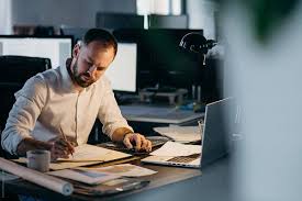 Businessman Or Architect In White Shirt Works With Project At Office And Writing Something Business Man Faces Film Stock Photos