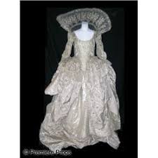 This is a gorgeous floral silverware pattern with the elegant grille (elongated) handles. Three Musketeers Milady Milla Jovovich Ball Gown