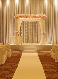 I loved the simplicity of the chairs and rectangle tables. Like Flowers On The Top And On The Sides Like This But Colours Of Flowers To Match The Wedding Desi Wedding Decor Wedding Hall Decorations Wedding Decorations