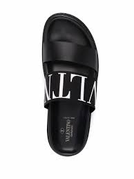 Valentino Garavani Logo Embossed Leather Slides Farfetch