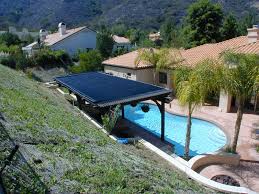Heliocol Solar Pool Heating Panels On Patio Rooftop Pool Solar Panels Solar Pool Heating Solar Pool Heater