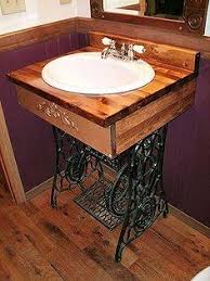 Original Idea For All Those Old Singer Sewing Machine Bases Bathroom Ideas Repurp Antique Sewing Machines Sewing Machine Tables Old Sewing Machines