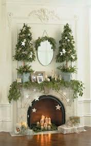 Love The Look From The Mantle Down The Trees Are Def Not My Fave But The Frameless Candles In The Fi Christmas Fireplace Christmas Trends Beautiful Christmas