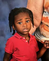 Can anyone please help clean up my son's one and only school picture? He  has special needs and likely needed a bodyguard to keep him in place. It  was probably this or