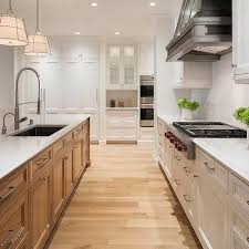 Oak Island With Blond Wood Floors Kitchen Renovation Oak Kitchen White Oak Kitchen