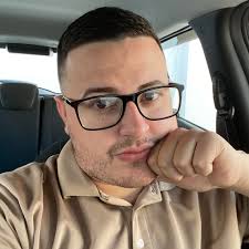 Advice. This is current cabinets. Do i leave or add addional row to make  closer to ceiling? Bf thinks won't look good. Advice (We have vaulted  ceiling) This is current vs what