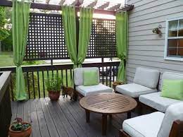 Trailing plants like ivy are excellent fillers, but just about any full plant or flower will work to suit the season. I Like The Idea Of The Lattice To Give Privacy With The Curtains Porch Idea Outdoor Rooms Home Home Decor