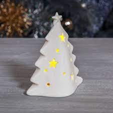 It also makes a statement indoors in an entryway or on a sideboard or tabletop. White Ceramic Led Light Up Christmas Tree The Gift Experience