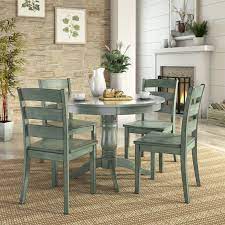 International concepts has the largest assortment of round dining room sets. Humblenest Farmers Market 5 Piece Round Dining Table Set With Ladder Back Chairs Round Dining Table Sets Small Kitchen Tables Kitchen Table Settings