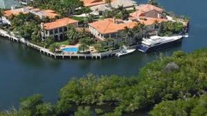 Son of vitamin kingpin sells mansion with custom-built pub