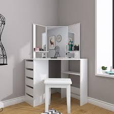 A lower shelf provides room for decor or storage baskets, while a small drawer built into the face hides away small items within convenient reach. Vanity Table With Storage Cabinet Modern Makeup Vanity Dressing Table Dresser Desk Corner Table With 3 Mirror For Bedroom Small Space Bathroom Corner Vanity Dressing Table For Female Women Girls Bedroom Sets Home