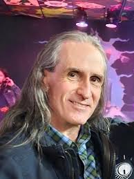 What instrument is Marilyn Monroe playing?