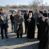U.S. Navy Chaplain Lt. Michael Hendrickson helps clean up the Greek  Orthodox Church of New Orleans after Hurricane Katrina.