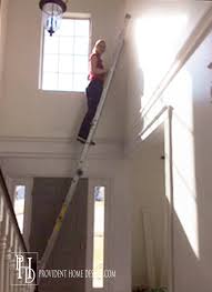 But we never actually painted the stairwell, so it was just these weird splotches of paint. The Secret To Painting A 2 Story Wall