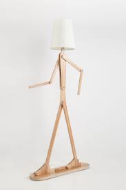 How To Make An Interesting Art Piece Using Tree Branches Ehow Standard Lamps Contemporary Floor Lamps Floor Lamp With Shelves