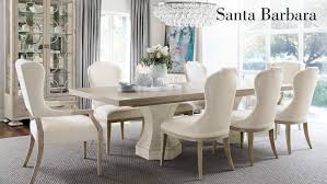 The acrylic base of this glass dining table features an elegant cast wood grain pattern, which draws eyes ever so slightly. All Dining Room Items Bernhardt