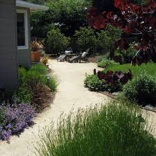 Mediterranean Garden With Curving Pathways Of Dg And Drought Tolerant Plants Mediterra Garden Landscape Design Mediterranean Landscaping Backyard Landscaping