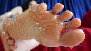 Oiled feet with toe rings - foot fetish padrona italiana mistress lotion  body soles mesmerizing toes