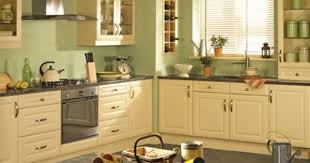 The Kitchen Stop Yellow Kitchen Cabinets Green Kitchen Walls Kitchen Design