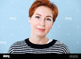 Portrait of a middle aged woman with short ginger hair Stock Photo