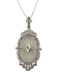 Prices vary depending on the materials involved, the quality. 10k White Gold Art Deco Filigree Camphor Glass Pendant Chain