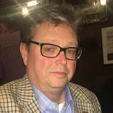 Tributes to 'one of a kind' university lecturer