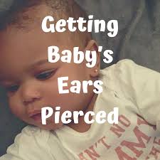 Piercing Kali S Ears Baby Ear Piercing Baby Month By Month Baby Life Hacks