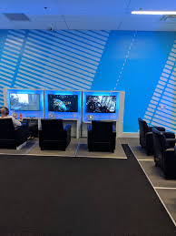 Spending The Next 4 Hours In The Dfw Airport Gaming Lounge The Best 20 Bucks You Can Spend Gaming Lounge Video Game Rooms Game Cafe