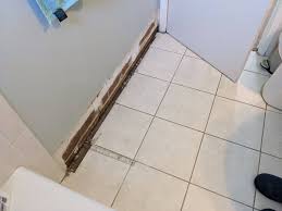 The eaves are the edges of the roof which overhang the face of a wall and, normally, project beyond the side of a building. Filling Big Horizontal Gaps In Bathroom Tile Home Improvement Stack Exchange