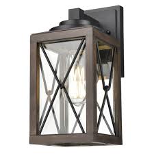 Black and woodgrain finish motion sensor dusk to dawn outdoor wall sconce with striped clear glass. County Fair Outdoor Wall Sconce By Dvi Lighting Dvp43371bk Iw Cl