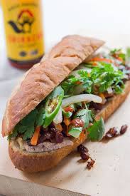 Xếp một vài lát thịt xá xíu vào. Banh Mi Recipe With Easy Chinese Barbecued Pork
