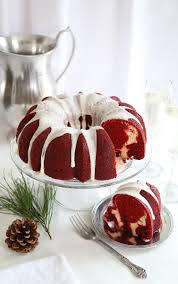 We think of them as a baker's secret weapon: Red Velvet Cream Cheese Swirl Bundt Cake Sprinkle Bakes