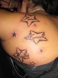 The name tattoo design below is a unique piece of art with colorful bold name tattoo fonts that makes the entire design to look amazing. Stars With Names In Them Tattoo By Cipherus Lee Liongodz Tattoo Studio 401 N Sante Fe Tattoo Studio Tattoos Name Tattoos
