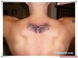 Whether you find the beauty of the simple things in life or have an overall carefree attitude, getting a minimalistic angel tattoo is ideal. Baby Angel Tattoo On Man Upperback