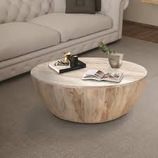 This Round Shape Urban Port Coffee Table Is Made From Mango Wood And Features A Smooth Wide T Round Wood Coffee Table Drum Coffee Table Mango Wood Coffee Table
