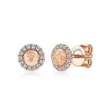 The earrings studs are rose in color and have an long lasting lustre. 14k Rose Gold Hammered Diamond Stud Earrings