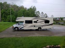 Self leveling jacks for class c rv. How To Lift Front End Of Class C Motorhome To Level Out When Parked Etrailer Com
