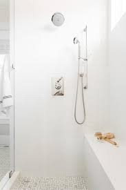 In one of our houses, we decided to do white grout on the bathroom floor. Shower With White Subway Tiles And White Grout Transitional Bathroom
