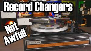 A rod positioned in the center holds the record (which has a hole in its center) in place. Automatic Record Changers We Used To Like Them Youtube