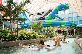 Slide On Indoor Water Parks Near Nyc Indoor Waterpark Water Park New York Attractions