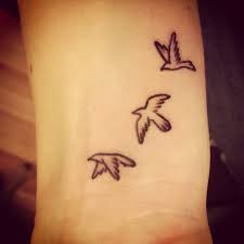 Three Birds On A Wire Tattoo Love This I D Have Them In A Clutter Of 10 But The 10th In Black Bird Outline Tattoo Bird Tattoo Wrist Wrist Tattoos