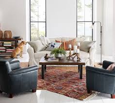 You can make your own blanket ladder for around $5 whereas the pb item is over $200. Pb Comfort Roll Arm Slipcovered Sofa Pottery Barn