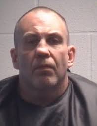 Man accused of hitting another in the head with a hammer