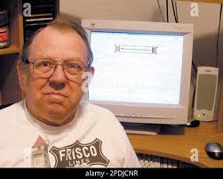 ADVANCE FOR WEEKEND NOV. 26-27 ** Jack Forbes of Rolla, Mo., sits next to  his computer displaying the Web site he operates, Missouridepots.com, at  his home in Rolla, Mo.,