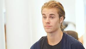 Justin Bieber sued for posting his own photo