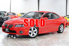 Image result for Medium Red Mica 2004 Pontiac